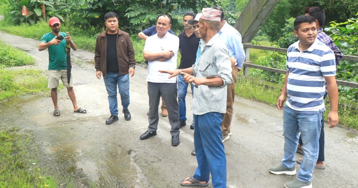 Minister inspects monsoon-damaged PMGSY Road at Chujachen constituency